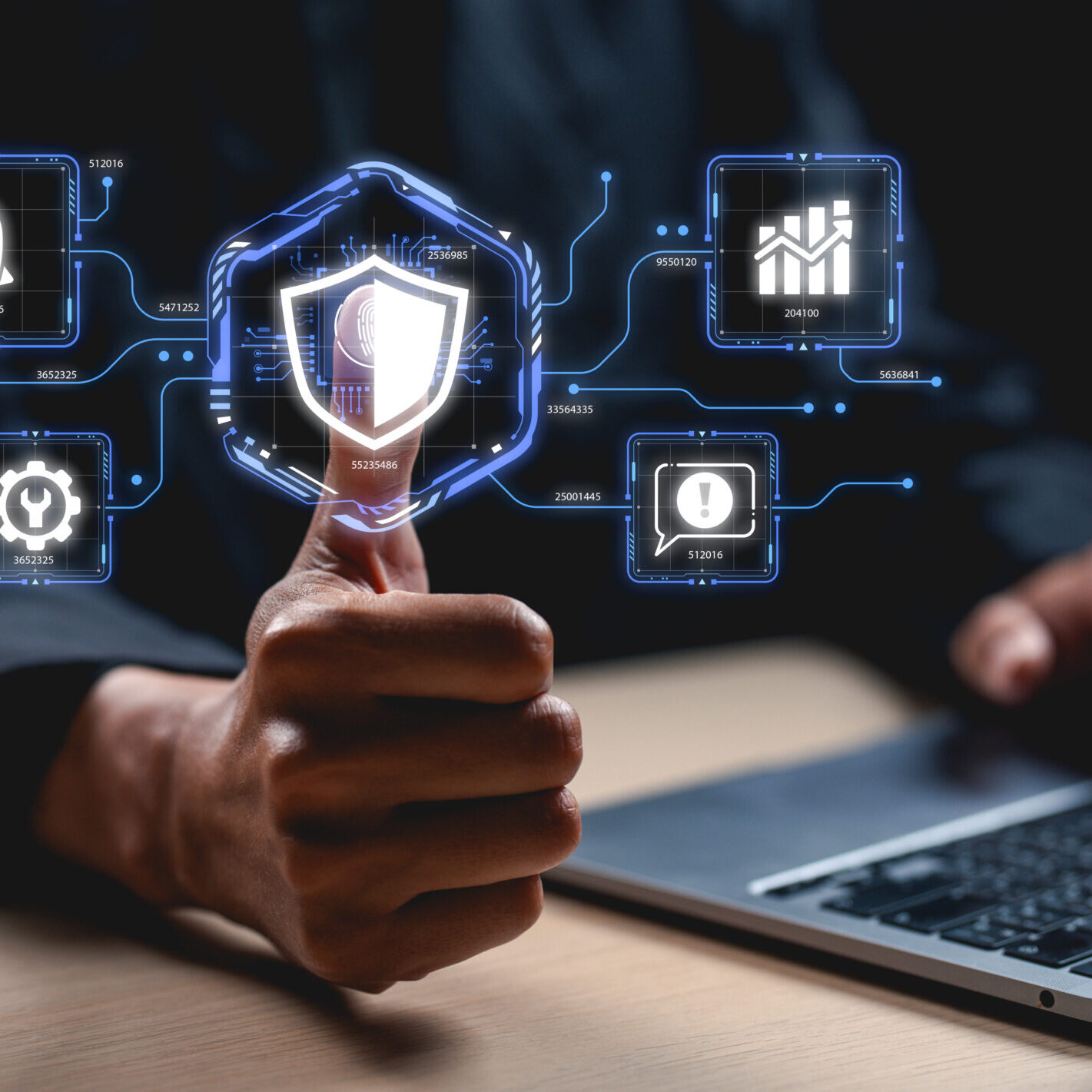 A hand holds a digital shield, surrounded by icons representing cybersecurity metrics, illustrating the intersection of technology and protection.
